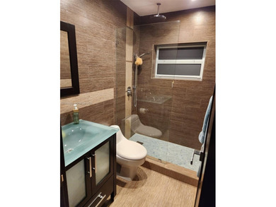 One story, single family, completely remodeled, 3 bedroom 2 on Jim McLean Signature Course in Florida - for sale on GolfHomes.com, golf home, golf lot