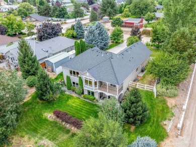 Nestled on nearly a one-acre lot, this retreat boasts mountain on Purple Sage Golf Course in Idaho - for sale on GolfHomes.com, golf home, golf lot