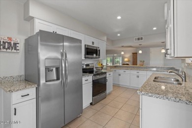 Beautifully renovated two bedroom/2 bath with enclosed bonus on Sun City Country Club in Arizona - for sale on GolfHomes.com, golf home, golf lot