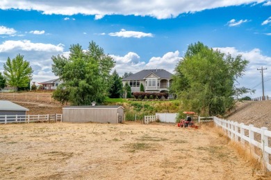 Nestled on nearly a one-acre lot, this retreat boasts mountain on Purple Sage Golf Course in Idaho - for sale on GolfHomes.com, golf home, golf lot