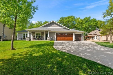 Welcome to your dream full-time residence in the heart of Four on Tan-Tar-A Golf Club in Missouri - for sale on GolfHomes.com, golf home, golf lot