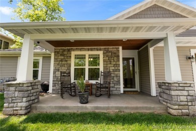 Welcome to your dream full-time residence in the heart of Four on Tan-Tar-A Golf Club in Missouri - for sale on GolfHomes.com, golf home, golf lot