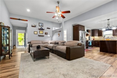 Welcome to your dream full-time residence in the heart of Four on Tan-Tar-A Golf Club in Missouri - for sale on GolfHomes.com, golf home, golf lot