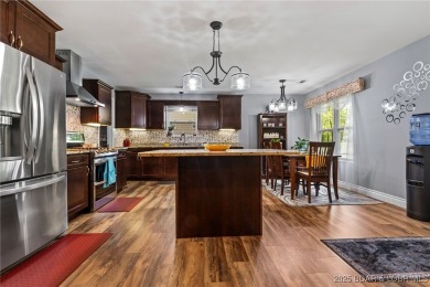 Welcome to your dream full-time residence in the heart of Four on Tan-Tar-A Golf Club in Missouri - for sale on GolfHomes.com, golf home, golf lot