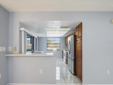 Located in the desirable 24-hour guard-gated community of East on East Lake Woodlands Country Club in Florida - for sale on GolfHomes.com, golf home, golf lot