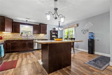 Welcome to your dream full-time residence in the heart of Four on Tan-Tar-A Golf Club in Missouri - for sale on GolfHomes.com, golf home, golf lot