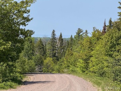 This attractive Keweenaw parcel is ready for your next getaway on Sandy Pebbles Golf Course in Michigan - for sale on GolfHomes.com, golf home, golf lot