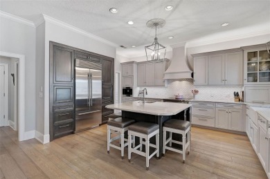 **STUNNINGLY DESIGNED and UPDATED -- ARCHITECTURAL ESTATE in the on The Oaks Club in Florida - for sale on GolfHomes.com, golf home, golf lot