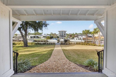 RARE DEEP WATERFRONT HOME ON MARINA ROAD IN Orange Beach - NO on Orange Beach Golf Center in Alabama - for sale on GolfHomes.com, golf home, golf lot