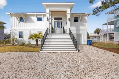 RARE DEEP WATERFRONT HOME ON MARINA ROAD IN Orange Beach - NO on Orange Beach Golf Center in Alabama - for sale on GolfHomes.com, golf home, golf lot