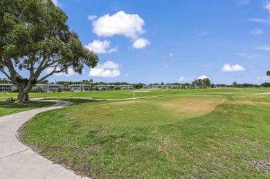 Enjoy stunning golf course views from this beautifully on Kings Point Golf - Executive in Florida - for sale on GolfHomes.com, golf home, golf lot