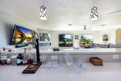 Located in the heart of the golf course area, this stunning on London Bridge Golf Course in Arizona - for sale on GolfHomes.com, golf home, golf lot