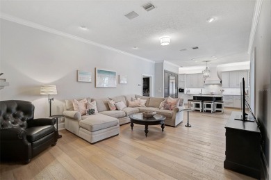 **STUNNINGLY DESIGNED and UPDATED -- ARCHITECTURAL ESTATE in the on The Oaks Club in Florida - for sale on GolfHomes.com, golf home, golf lot