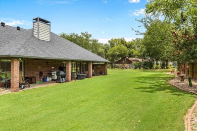 A unique, very large .52 acre lot combined with an updated on Pecan Plantation Country Club in Texas - for sale on GolfHomes.com, golf home, golf lot
