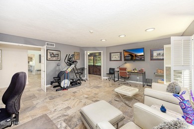 Located in the heart of the golf course area, this stunning on London Bridge Golf Course in Arizona - for sale on GolfHomes.com, golf home, golf lot