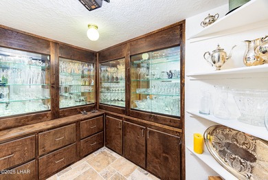 Located in the heart of the golf course area, this stunning on London Bridge Golf Course in Arizona - for sale on GolfHomes.com, golf home, golf lot
