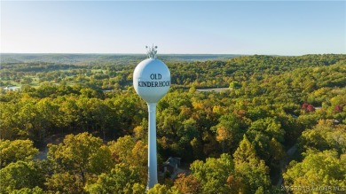 Step into the charm of true log home living in the prestigious on The Club At Old Kinderhook in Missouri - for sale on GolfHomes.com, golf home, golf lot