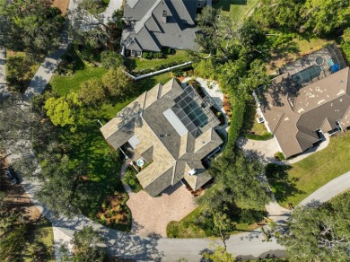 **STUNNINGLY DESIGNED and UPDATED -- ARCHITECTURAL ESTATE in the on The Oaks Club in Florida - for sale on GolfHomes.com, golf home, golf lot