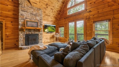 Step into the charm of true log home living in the prestigious on The Club At Old Kinderhook in Missouri - for sale on GolfHomes.com, golf home, golf lot