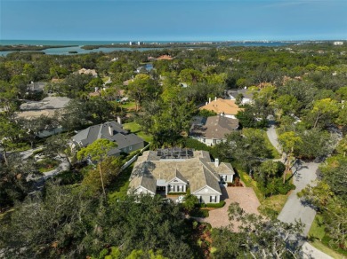 **STUNNINGLY DESIGNED and UPDATED -- ARCHITECTURAL ESTATE in the on The Oaks Club in Florida - for sale on GolfHomes.com, golf home, golf lot