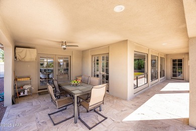 Located in the heart of the golf course area, this stunning on London Bridge Golf Course in Arizona - for sale on GolfHomes.com, golf home, golf lot