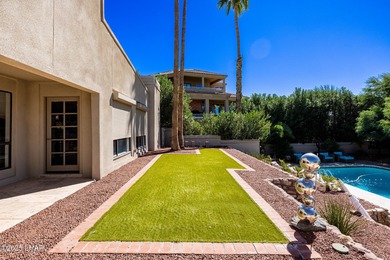 Located in the heart of the golf course area, this stunning on London Bridge Golf Course in Arizona - for sale on GolfHomes.com, golf home, golf lot