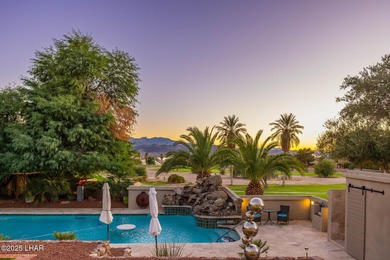 Located in the heart of the golf course area, this stunning on London Bridge Golf Course in Arizona - for sale on GolfHomes.com, golf home, golf lot