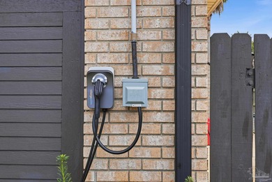 Deep water canal-front home in Gulf Breeze! Boating enthusiasts on Tiger Point Golf and Country Club in Florida - for sale on GolfHomes.com, golf home, golf lot