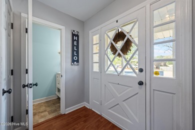 Welcome home! This spacious 4-bedroom 2.5 bathroom beauty is on Jacksonville Country Club in North Carolina - for sale on GolfHomes.com, golf home, golf lot