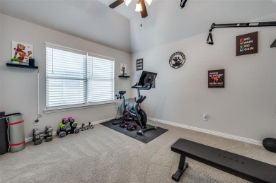 Welcome to this stunning 4-bedroom, 4.5-bath home nestled in the on The Tribute At the Colony in Texas - for sale on GolfHomes.com, golf home, golf lot