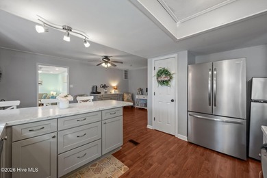 Welcome home! This spacious 4-bedroom 2.5 bathroom beauty is on Jacksonville Country Club in North Carolina - for sale on GolfHomes.com, golf home, golf lot