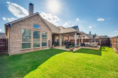 Welcome to this stunning 4-bedroom, 4.5-bath home nestled in the on The Tribute At the Colony in Texas - for sale on GolfHomes.com, golf home, golf lot