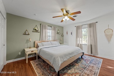 Welcome home! This spacious 4-bedroom 2.5 bathroom beauty is on Jacksonville Country Club in North Carolina - for sale on GolfHomes.com, golf home, golf lot