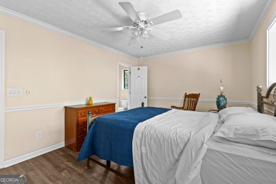 Welcome to 329 Chickadee Ct, a retreat where comfort meets the on Turtle Cove Golf Course in Georgia - for sale on GolfHomes.com, golf home, golf lot