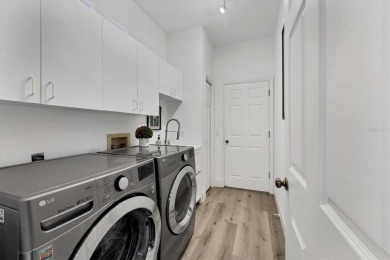 Step inside and be captivated by this spacious, light-filled on University Park Country Club in Florida - for sale on GolfHomes.com, golf home, golf lot