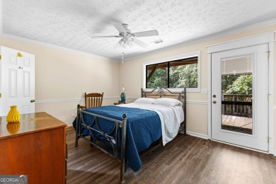 Welcome to 329 Chickadee Ct, a retreat where comfort meets the on Turtle Cove Golf Course in Georgia - for sale on GolfHomes.com, golf home, golf lot