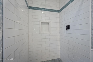 Welcome home! This spacious 4-bedroom 2.5 bathroom beauty is on Jacksonville Country Club in North Carolina - for sale on GolfHomes.com, golf home, golf lot