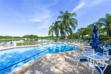 Step inside and be captivated by this spacious, light-filled on University Park Country Club in Florida - for sale on GolfHomes.com, golf home, golf lot