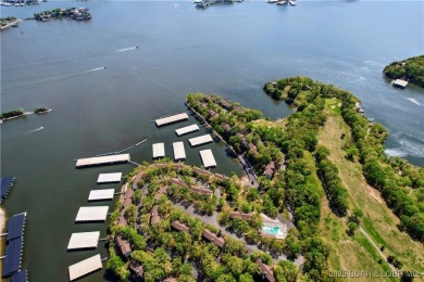The location at Water's Edge that everyone wants. A walk in unit on Seasons Ridge At Four Seasons in Missouri - for sale on GolfHomes.com, golf home, golf lot