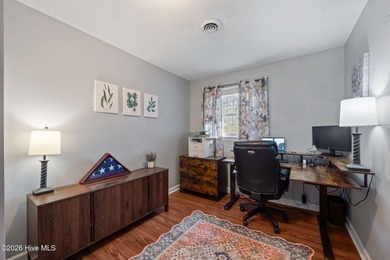 Welcome home! This spacious 4-bedroom 2.5 bathroom beauty is on Jacksonville Country Club in North Carolina - for sale on GolfHomes.com, golf home, golf lot