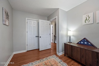 Welcome home! This spacious 4-bedroom 2.5 bathroom beauty is on Jacksonville Country Club in North Carolina - for sale on GolfHomes.com, golf home, golf lot