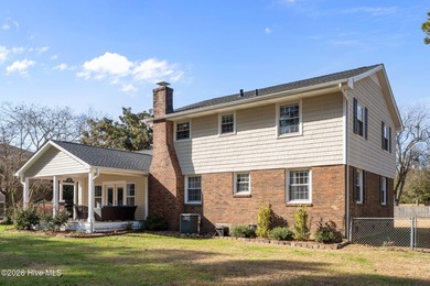 Welcome home! This spacious 4-bedroom 2.5 bathroom beauty is on Jacksonville Country Club in North Carolina - for sale on GolfHomes.com, golf home, golf lot