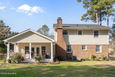 Welcome home! This spacious 4-bedroom 2.5 bathroom beauty is on Jacksonville Country Club in North Carolina - for sale on GolfHomes.com, golf home, golf lot
