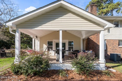 Welcome home! This spacious 4-bedroom 2.5 bathroom beauty is on Jacksonville Country Club in North Carolina - for sale on GolfHomes.com, golf home, golf lot