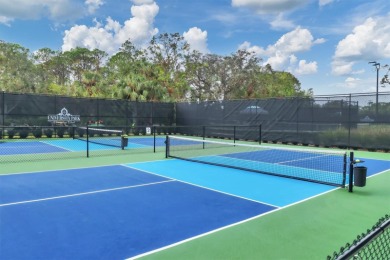 UPDATES: ROOF (2020), AC (2022) WATER HEATER (2022), KITCHEN & on University Park Country Club in Florida - for sale on GolfHomes.com, golf home, golf lot