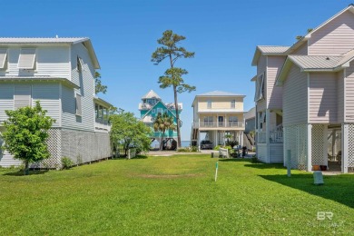 Build your dream coastal getaway in Bay Gardens-a charming and on Peninsula Golf and Racquet Club in Alabama - for sale on GolfHomes.com, golf home, golf lot