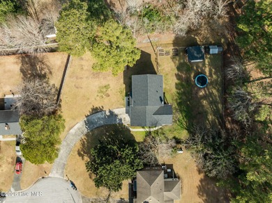 Welcome home! This spacious 4-bedroom 2.5 bathroom beauty is on Jacksonville Country Club in North Carolina - for sale on GolfHomes.com, golf home, golf lot