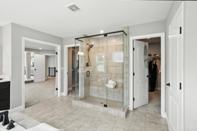 Only 2 years young, this stunning Fischer-built Marshall floor on Shaker Run Golf Club  in Ohio - for sale on GolfHomes.com, golf home, golf lot