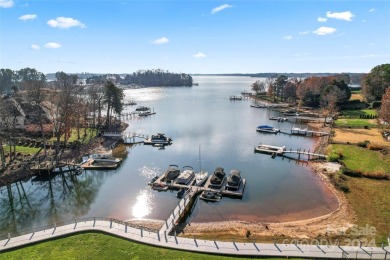 Experience breathtaking, long-range waterfront views from this on The Peninsula Club in North Carolina - for sale on GolfHomes.com, golf home, golf lot