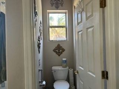 Southwest Living at its best.  Tuscan/Santa Barbara style home on Trilogy Golf Club At Power Ranch in Arizona - for sale on GolfHomes.com, golf home, golf lot